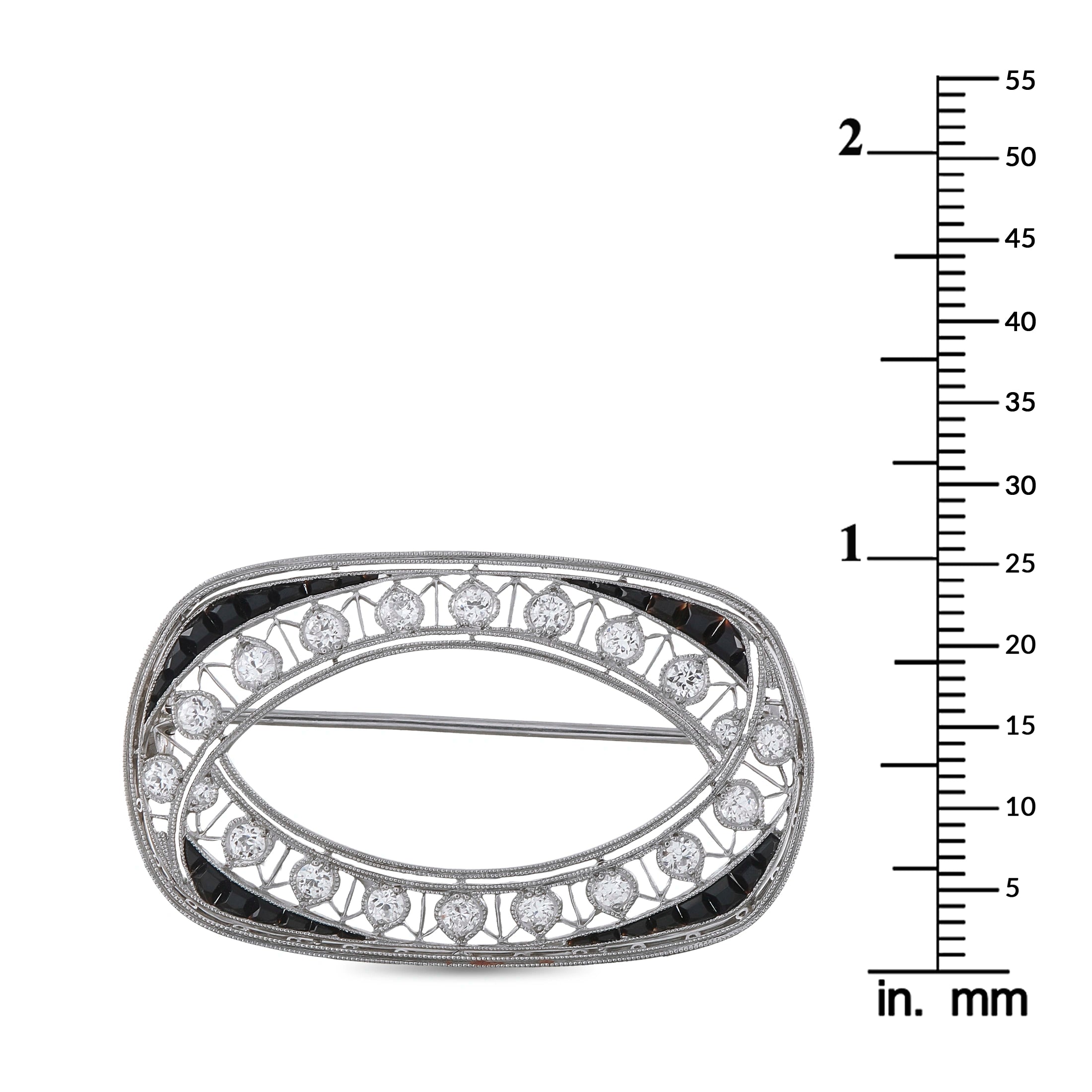 Platinum 0.80ct Diamond and Sapphire Brooch