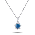 Platinum pendant necklace with blue sapphire center and diamond halo flower design