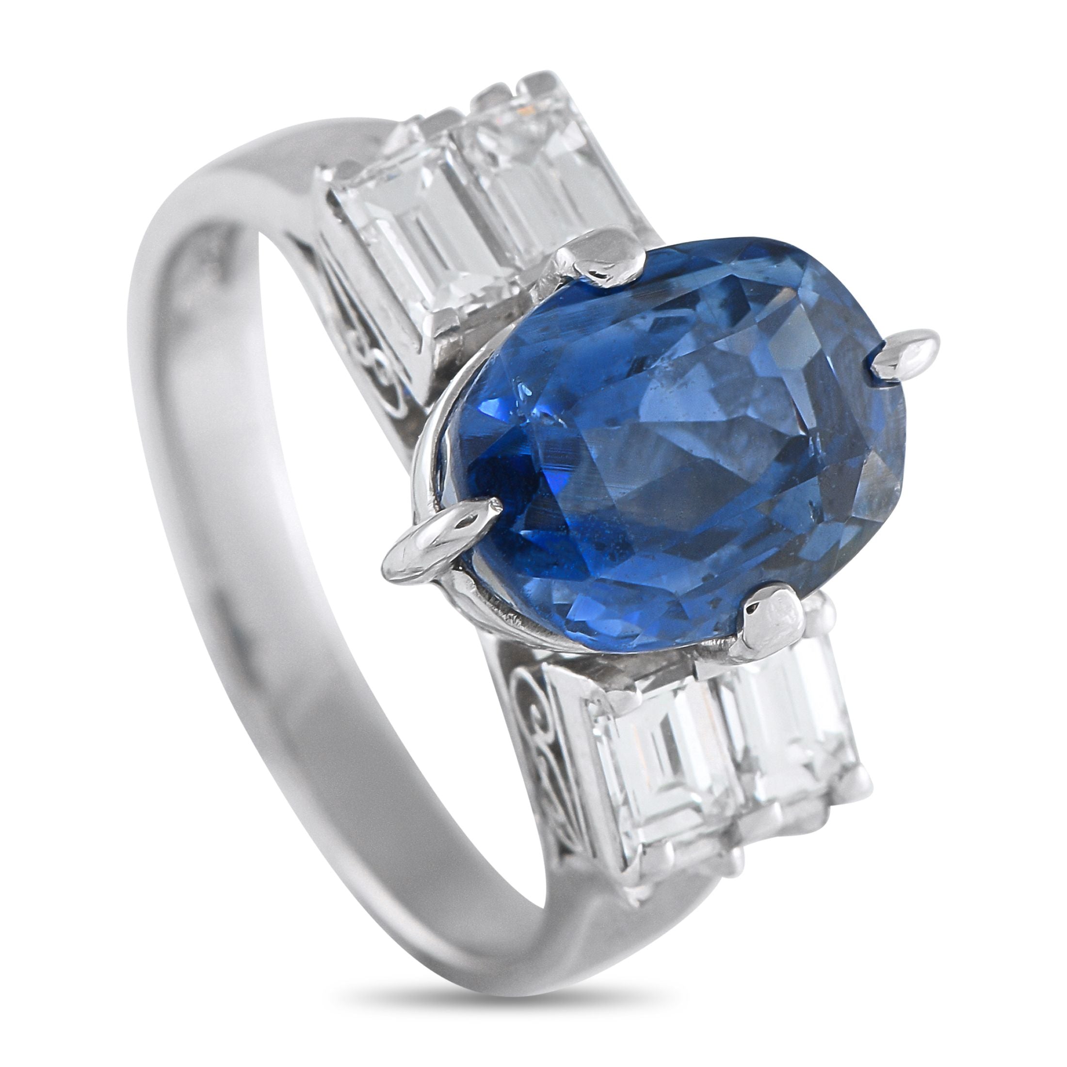 Exclusive Platinum 0.80ct Diamond and Sapphire Ring MF01-073125 – Bearing a centerpiece that speaks for itself, this Exclusiv