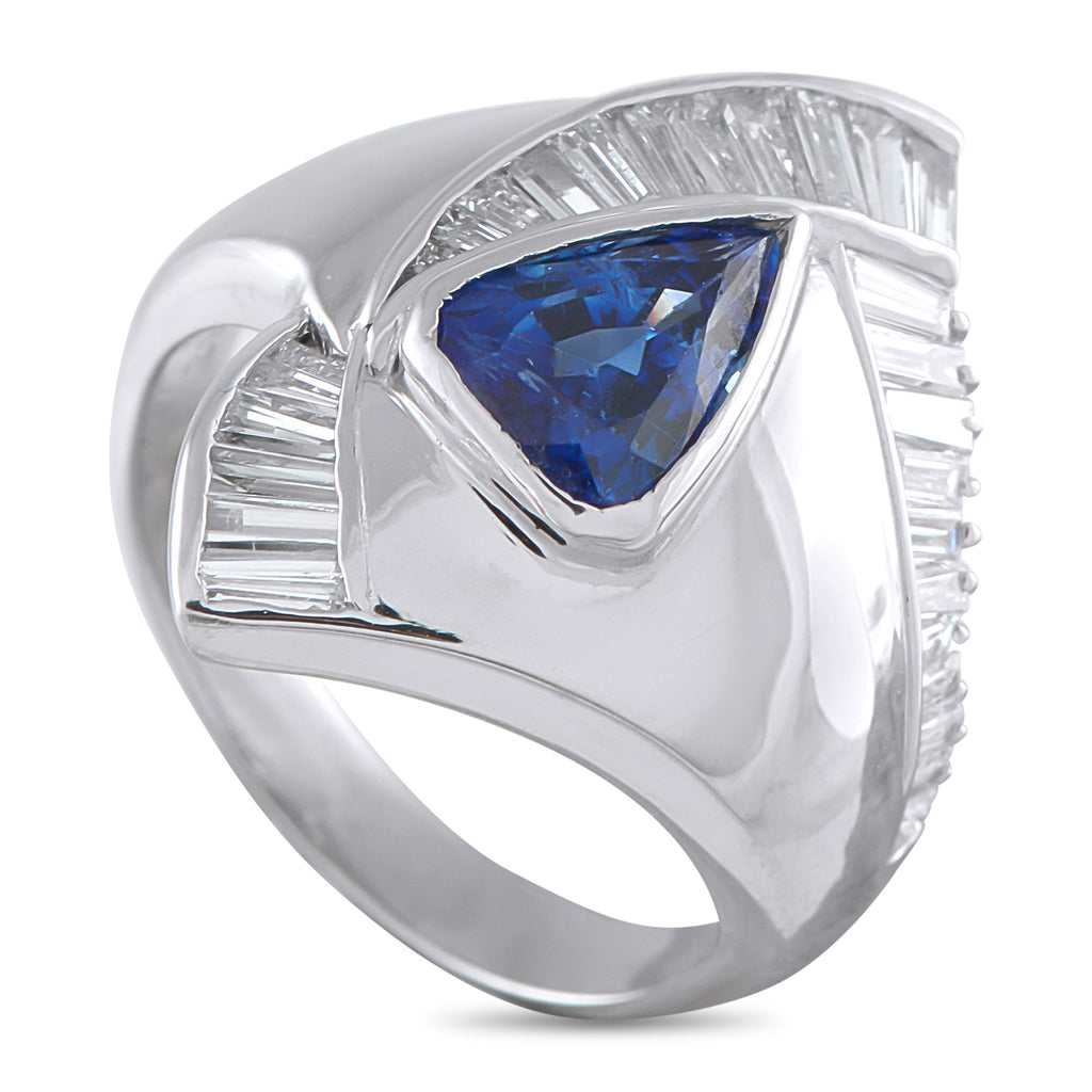 Exclusive Platinum 1.18ct Diamond and Sapphire Statement Ring - The bold contours and sculptural character of this ring instantly capture the eye. At its center lies a trillion-cut blue sap