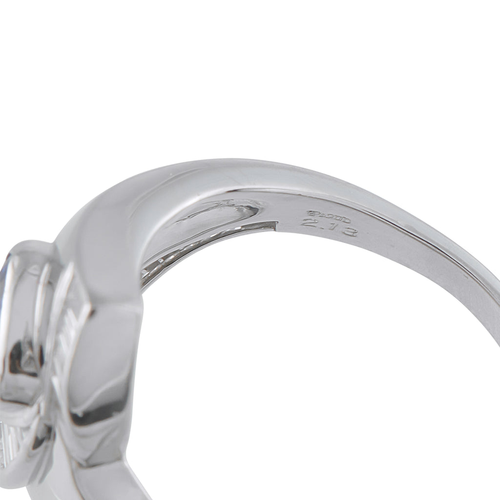 Platinum-tone ring interior with engraved hallmark on the inner band