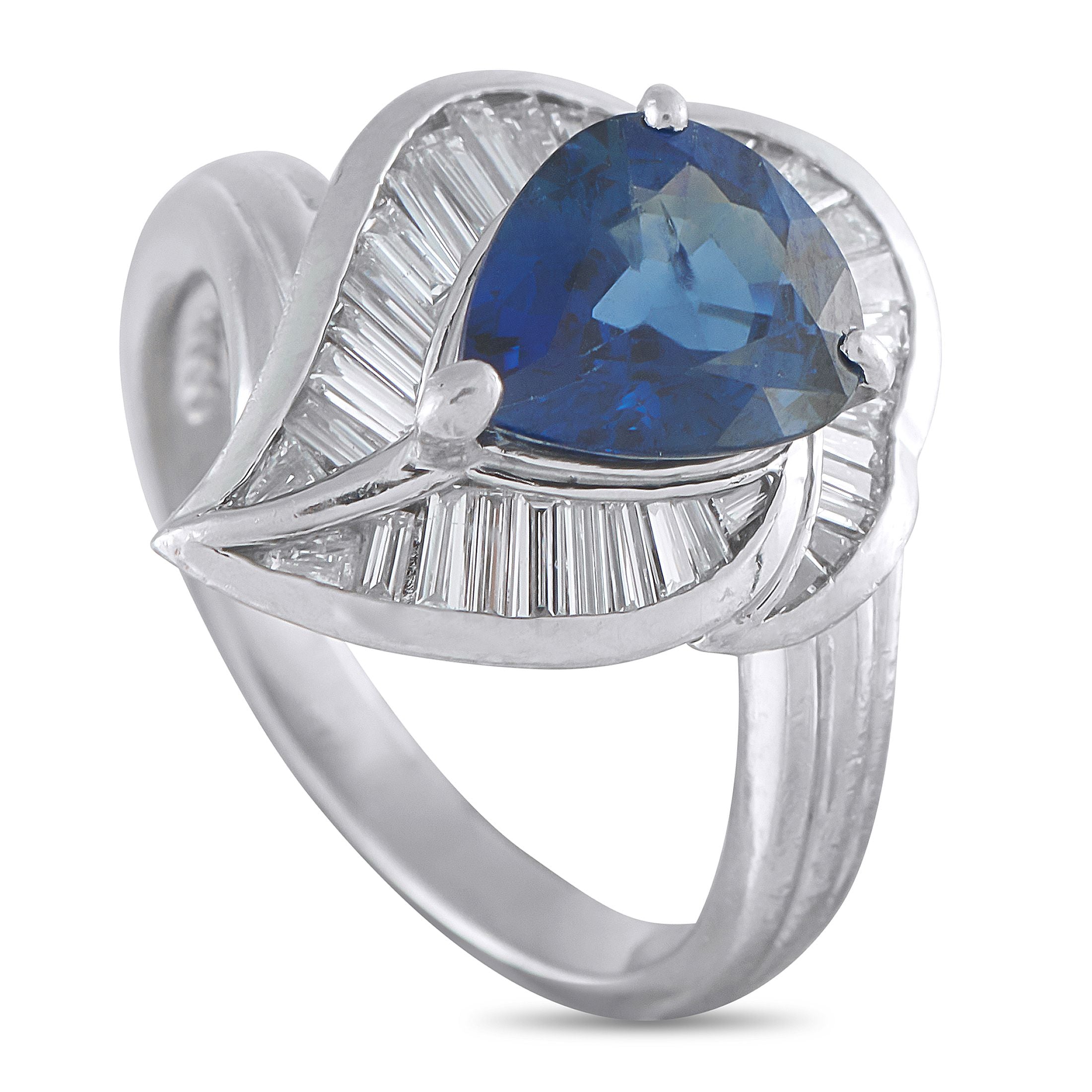 Exclusive Platinum 0.55ct Diamond and Sapphire Ring - A 2.22-carat sapphire shaped like a rounded triangle takes command at the center of this ring. Baguette diamonds set in curve