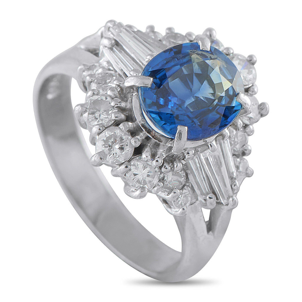 Exclusive Platinum 0.87ct Diamond and Sapphire Ring - Depth and movement define the beauty of this Exclusive  ring. At its center is a 1.97-carat oval sapphire on four prongs, its