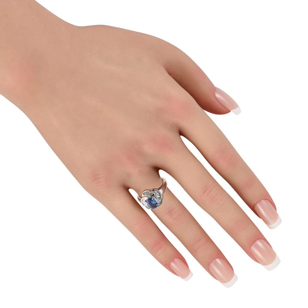 Platinum 0.43ct Diamond and Blue Sapphire Pinwheel Halo Ring