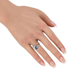 Platinum 0.43ct Diamond and Blue Sapphire Pinwheel Halo Ring