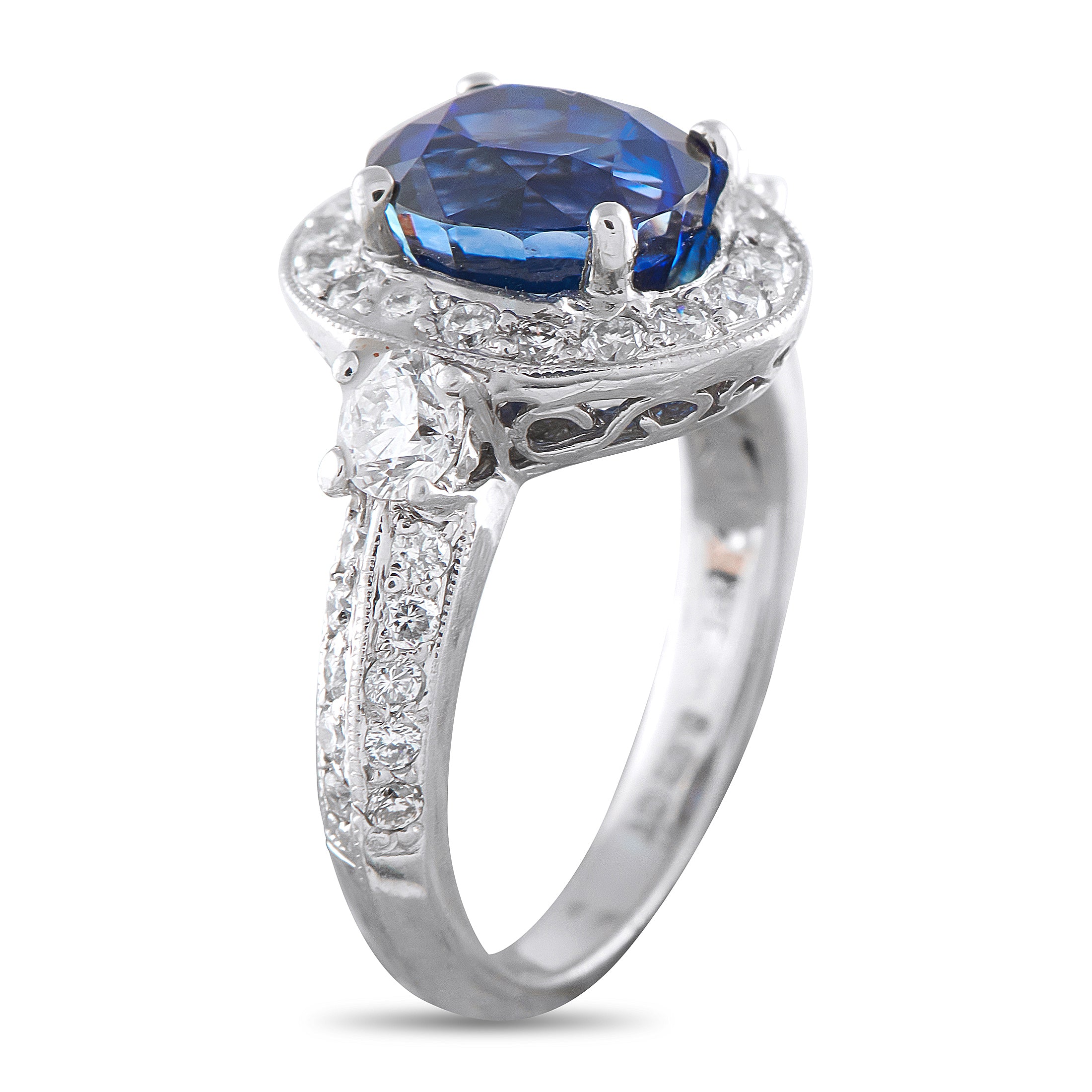 Platinum 0.78ct Diamond and Sapphire Ring