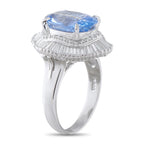Side view of sapphire and diamond ring showing raised setting and platinum band