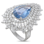 Platinum diamond and sapphire ring with a large pear-shaped blue sapphire and clustered diamonds.