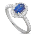 Platinum halo ring with oval blue sapphire and diamond accents
