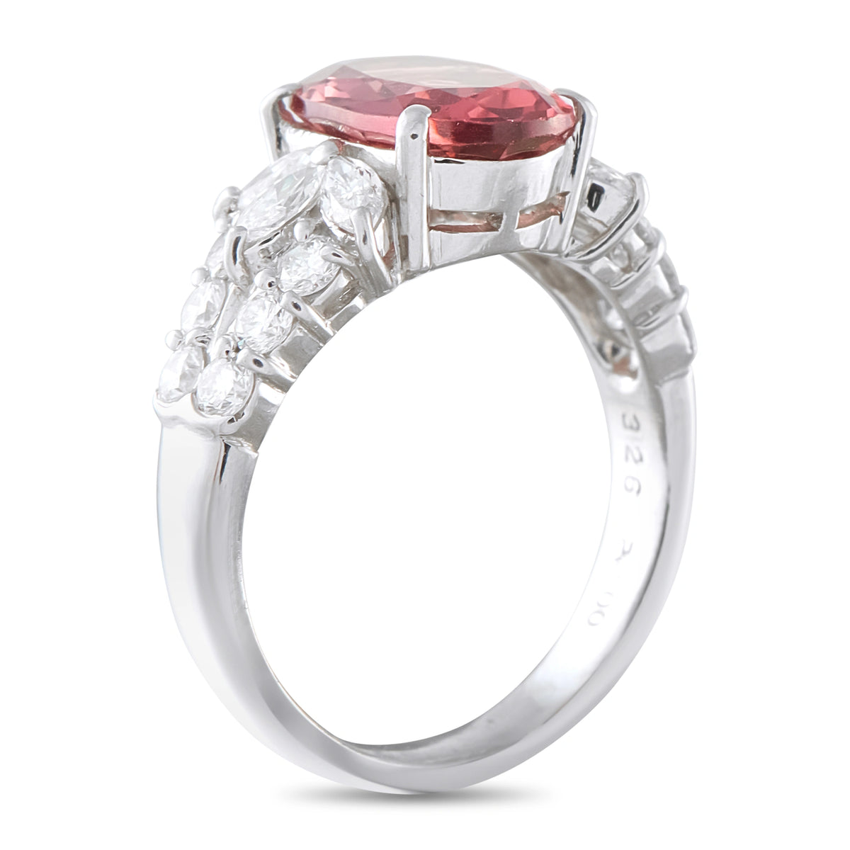 Platinum ring shown from the side, with an oval pink spinel and diamond-set shoulders