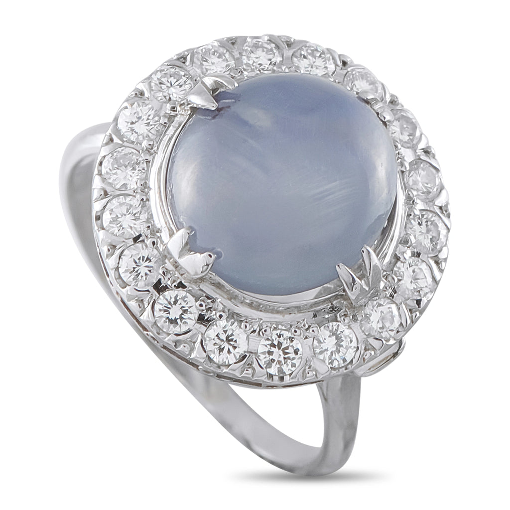 Antique platinum star sapphire and diamond halo ring