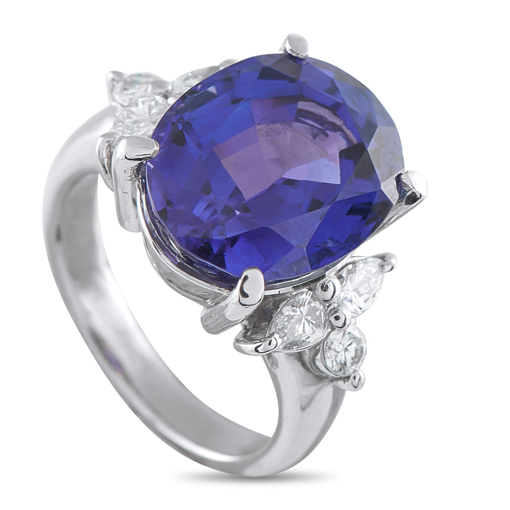 Exclusive Platinum 0.56ct Diamond and Tanzanite Ring - Set in platinum, this Exclusive  tanzanite and diamond ring presents a rare display of color at its most vivid. It centers on