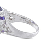 Platinum ring band detail showing the Pt900 hallmark and a partial view of the gemstones