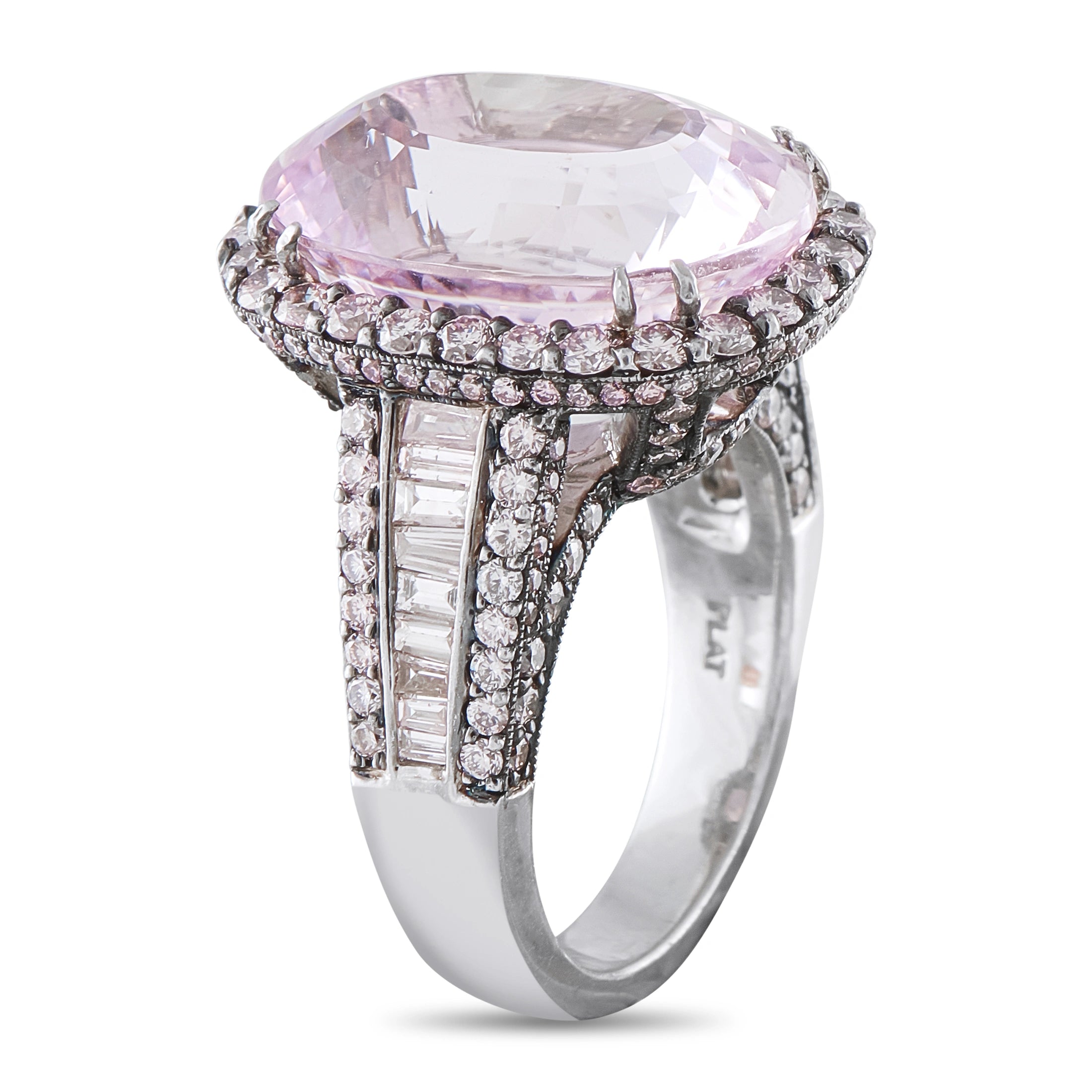 Platinum ring featuring oval pink center stone, round diamonds, and baguette accents