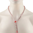 Geometric-link diamond lariat necklace shown worn, with a long drop pendant
