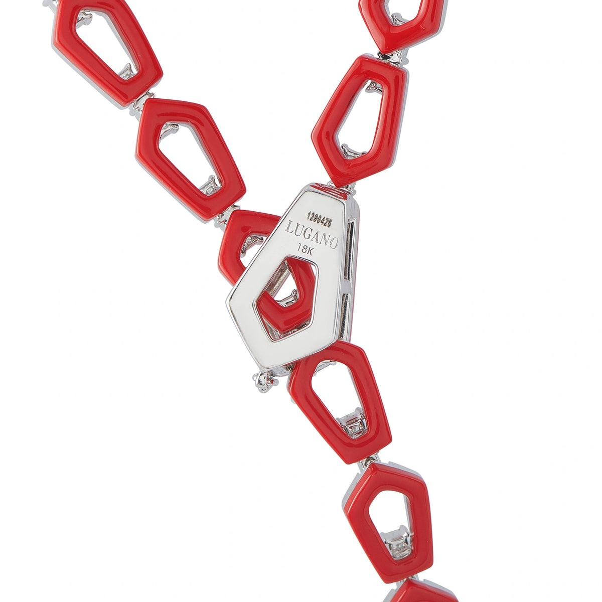 Close-up of the necklace's geometric links and Lugano 18K clasp