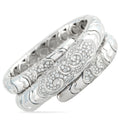 White gold diamond coil bangle with oval pavé motifs and curved metal pattern