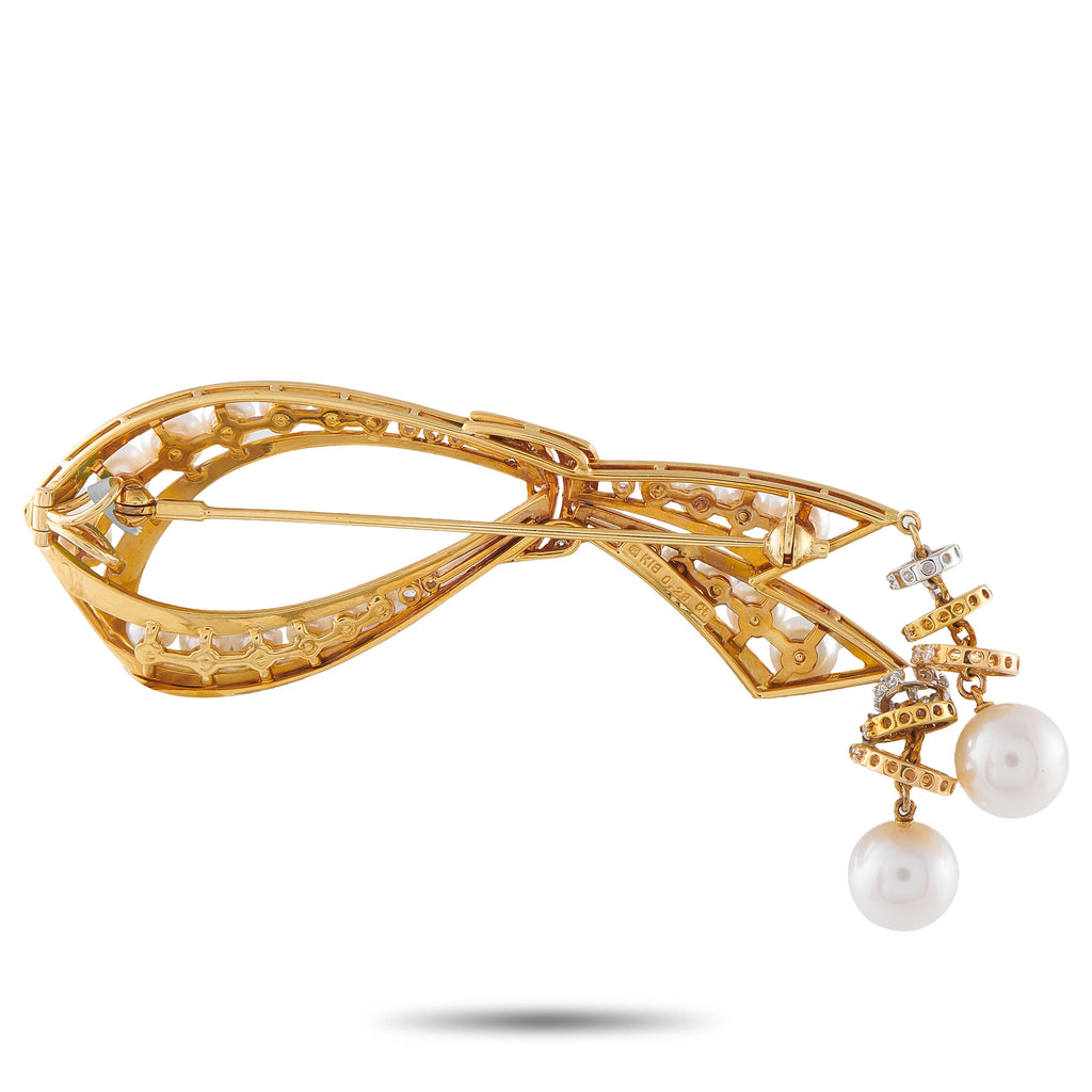 Mikimoto 18K yellow gold brooch with openwork bow, diamonds, and two dangling pearls