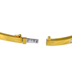 Yellow gold bracelet clasp with diamond and sapphire detail and engraved segment