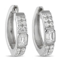 White gold huggie hoop earrings with rectangular diamond row and center emerald-cut stone