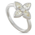 White gold diamond four-petal flower ring with pear-shaped center stones