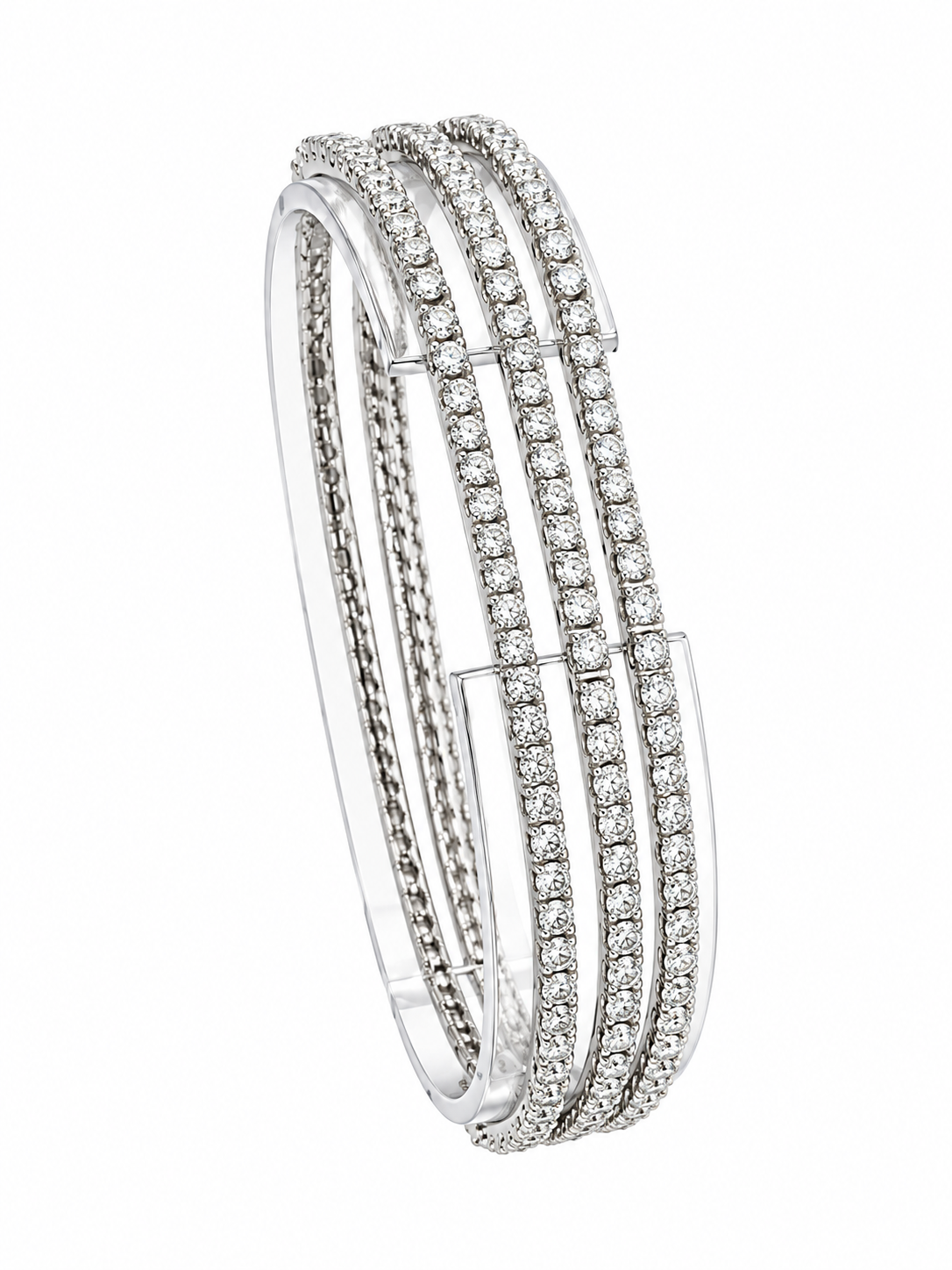Triple-row diamond bracelet in white gold with hinged oval bangle profile.
