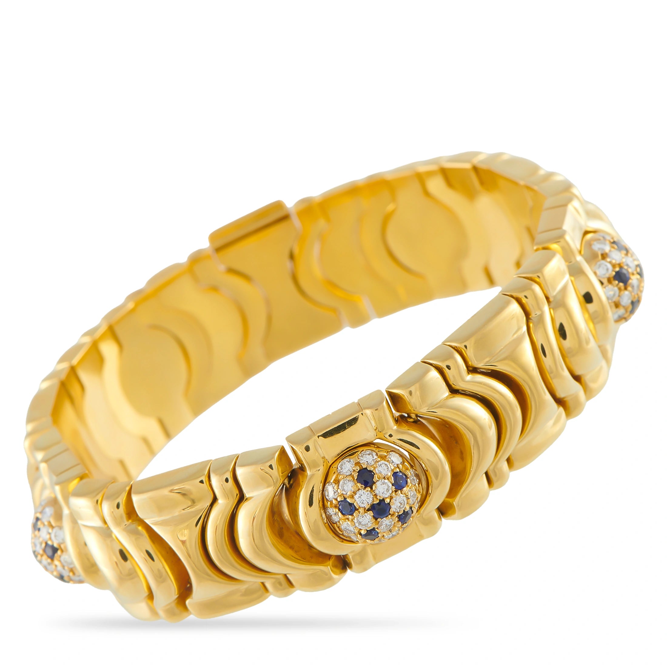 18K yellow gold bracelet with repeating fan links, diamond and sapphire accents