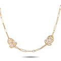 18K rose gold sautoir necklace with filigree medallion stations and curb chain links