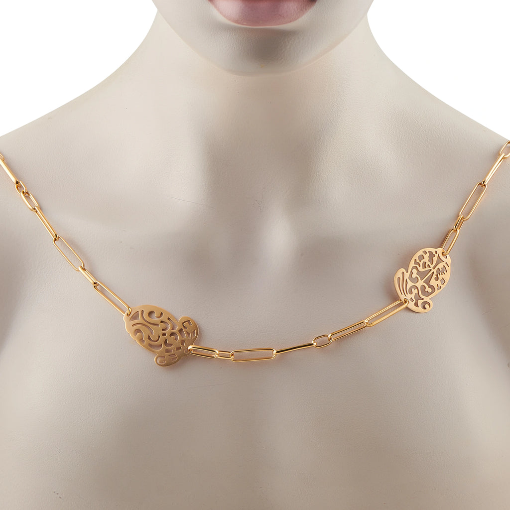 18K rose gold sautoir necklace worn on neck, filigree medallion stations on chain