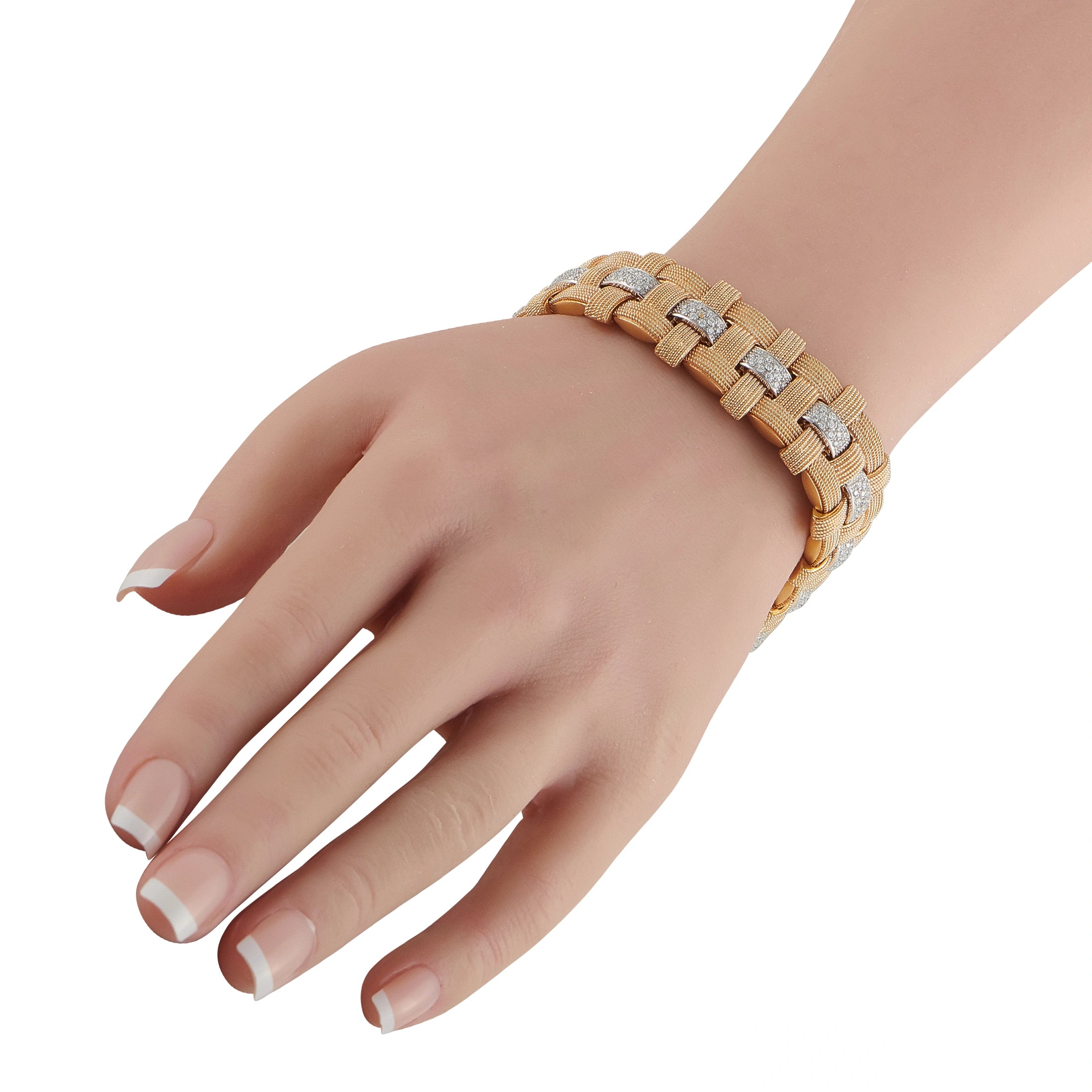 Rose gold woven bracelet with square diamond accents worn on wrist