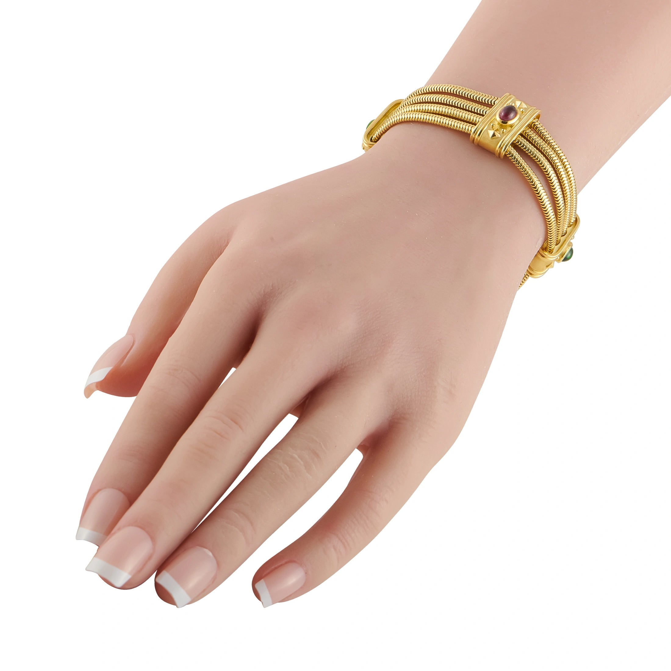18K yellow gold bracelet on wrist with purple gemstone accent and braided mesh links