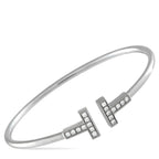 Tiffany & Co.Tiffany & Co. 18K White Gold Diamond T Bracelet - Modern and sophisticated, this Tiffany & Co. T Wire Bracelet pays homage to the luxury brand’s enduring legacy. At each end o