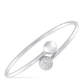 Tiffany & CO. HardWear white gold bangle with one polished and one pavé diamond sphere