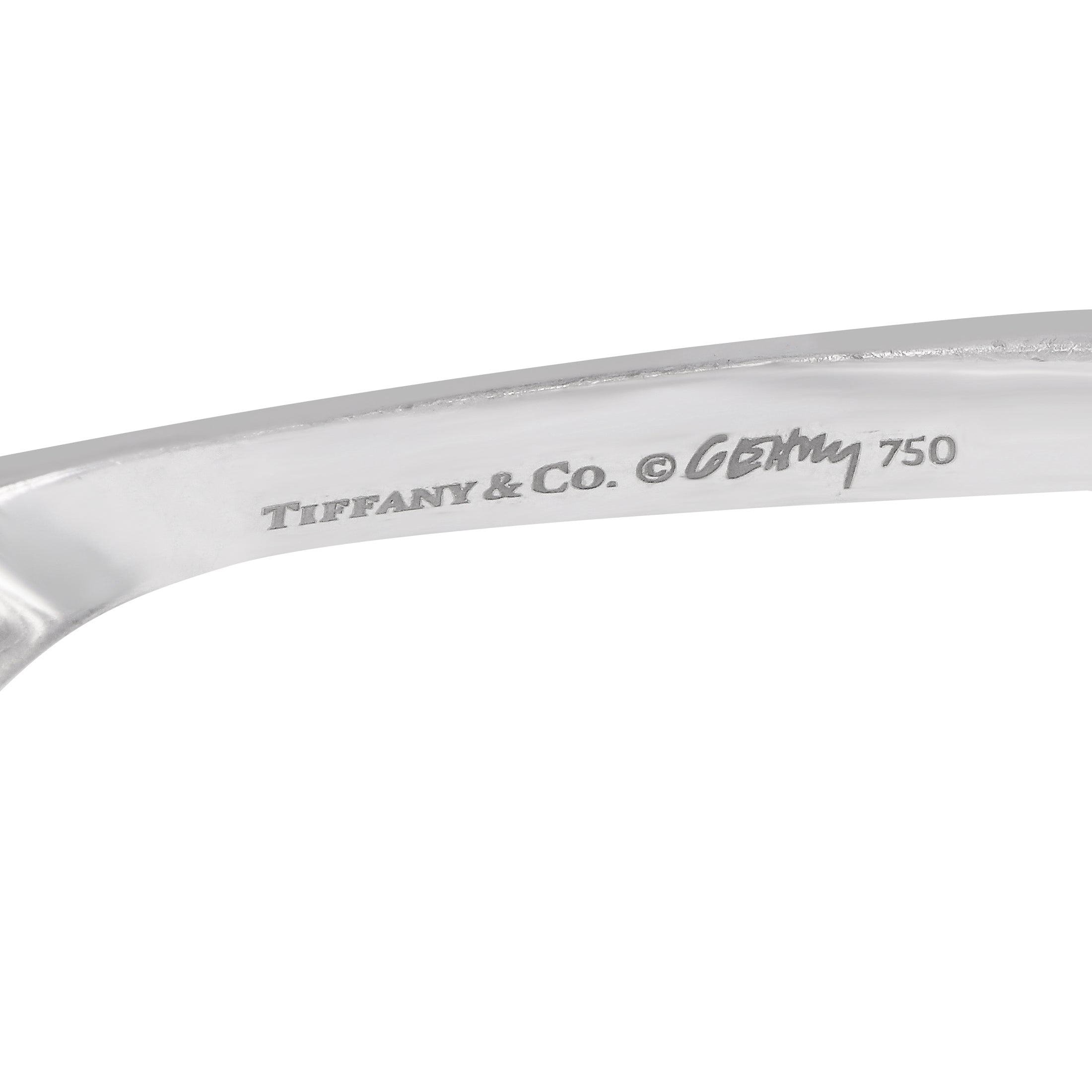 Engraved inside 18K white gold bracelet: Tiffany & Co. Gehry 750