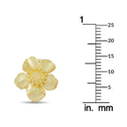 Dogwood flower earrings in 18K yellow gold, shown next to size ruler