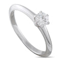 Platinum solitaire engagement ring with round brilliant diamond in prong setting