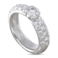 Platinum diamond ring with oval center stone and diamond pavé halo, angled