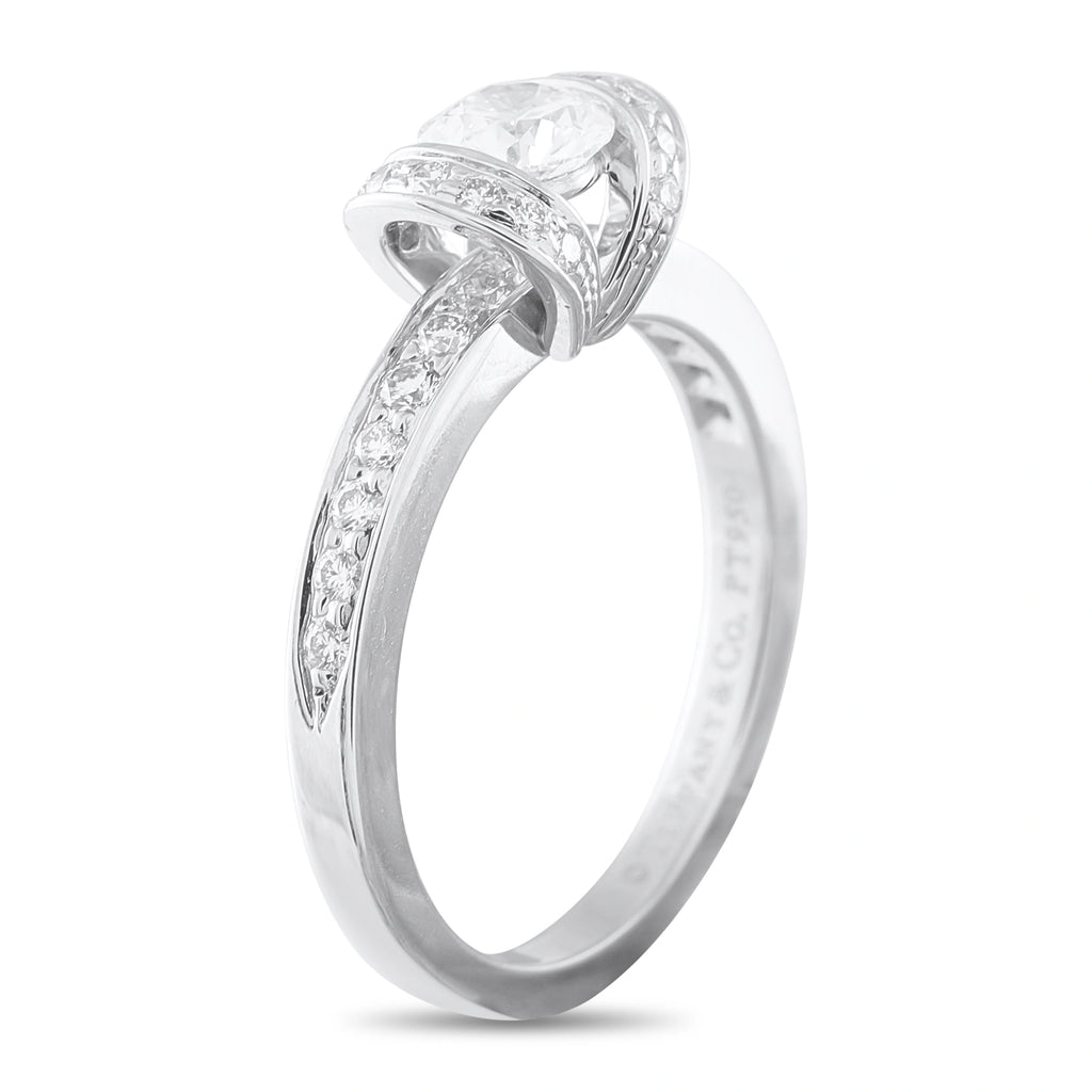 Tiffany & Co. platinum diamond ring with ribbon-style setting and pavé band