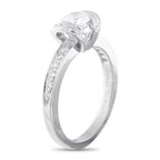 Tiffany & Co. platinum diamond ring with ribbon-style setting and pavé band