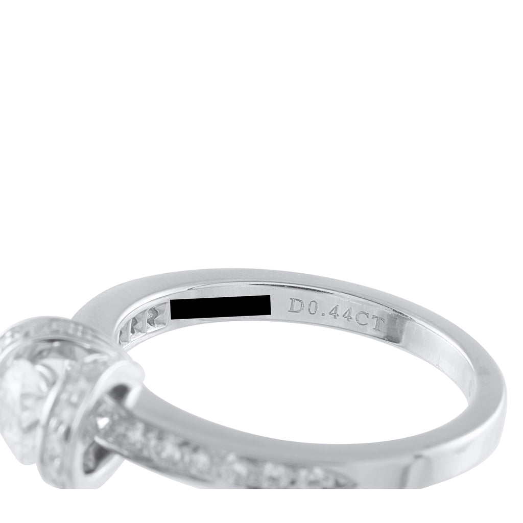 Tiffany & CO. platinum diamond ring with ribbon-style setting