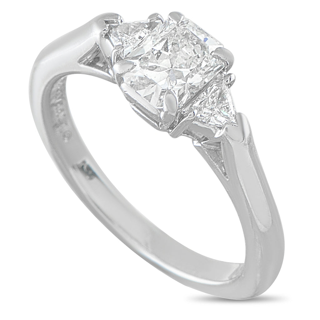Tiffany & Co. platinum diamond ring with a three-stone setting and prominent center diamond
