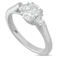 Tiffany & Co. platinum diamond ring with a three-stone setting and prominent center diamond