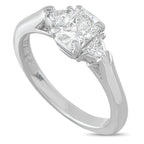 Tiffany & Co. platinum diamond ring with a three-stone setting and prominent center diamond