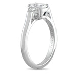 Tiffany & Co. platinum diamond ring shown from the side, highlighting its elevated setting and slim band