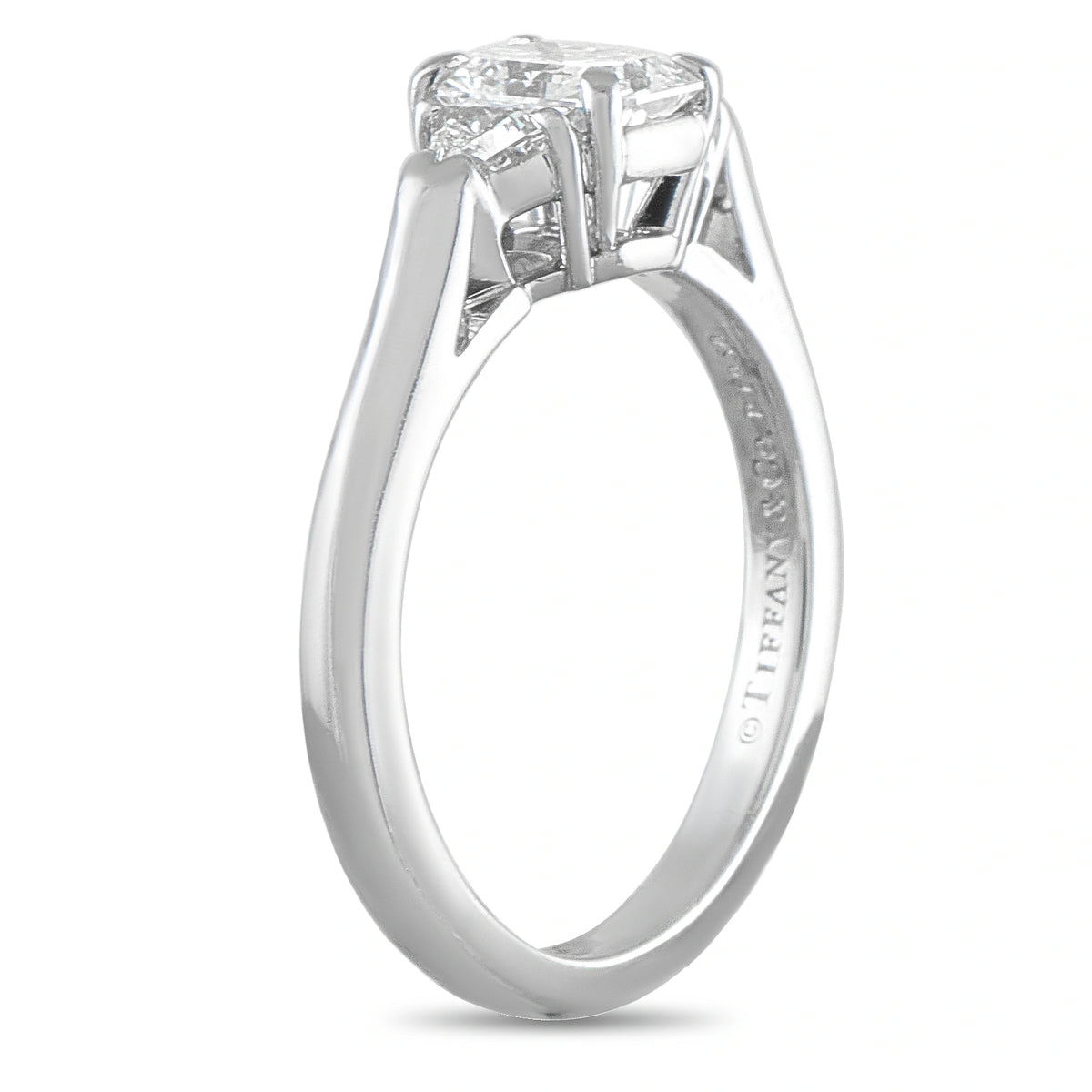 Tiffany & Co. platinum diamond ring shown from the side, highlighting its elevated setting and slim band