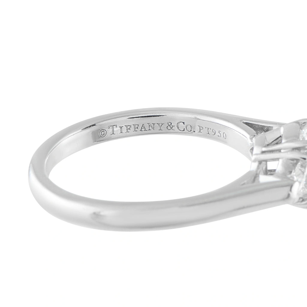 Tiffany & Co. platinum ring band detail with engraved brand and metal hallmark