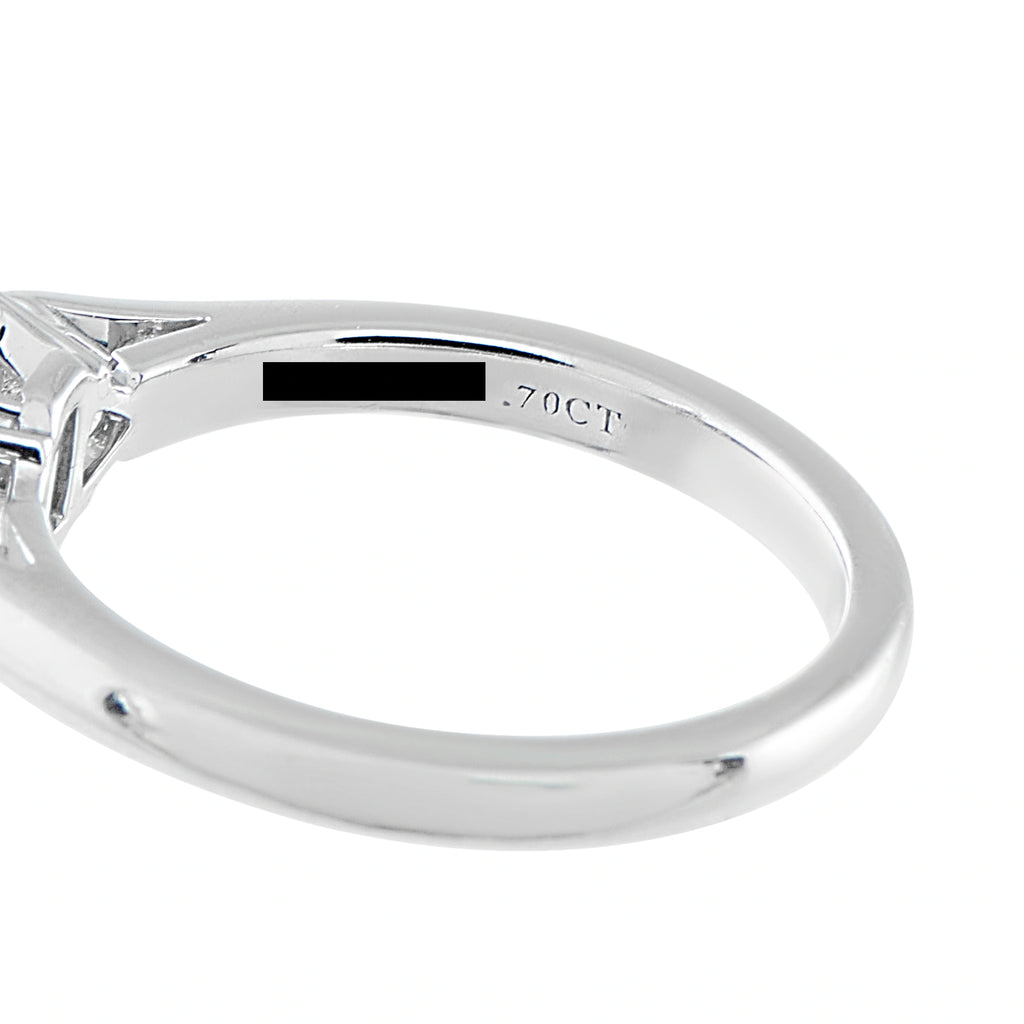 Tiffany & Co. platinum ring band detail with a visible diamond carat stamp