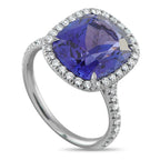 Tiffany & Co.Tiffany & Co. Platinum Diamond and Tanzanite Ring - A radiant blue Tanzanite gemstone makes a statement at the center of this impressive Tiffany & Co. ring. Set in Platinum, rou