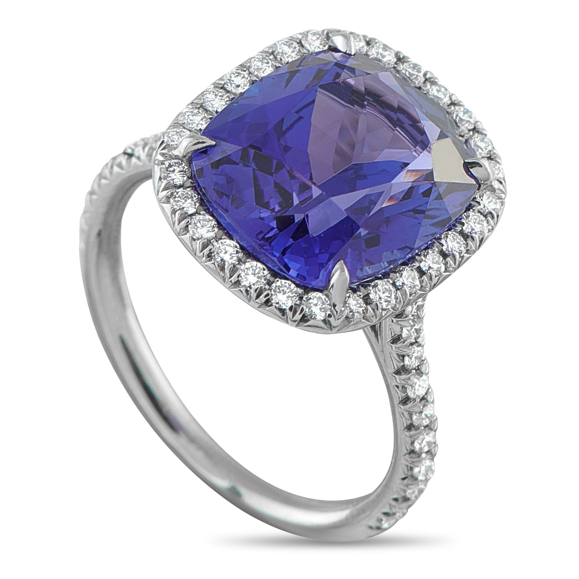 Tiffany & Co.Tiffany & Co. Platinum Diamond and Tanzanite Ring - A radiant blue Tanzanite gemstone makes a statement at the center of this impressive Tiffany & Co. ring. Set in Platinum, rou