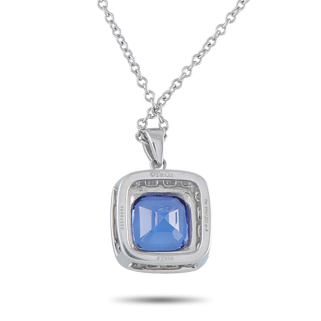 Platinum blue tanzanite square pendant with diamond border on chain